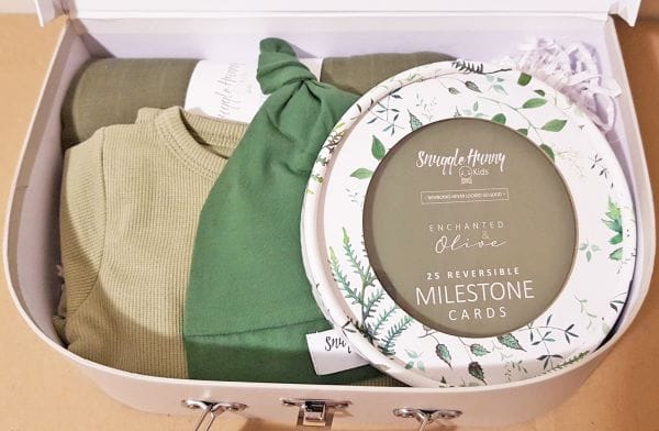 Small Snuggle Hunny Kids suitcase gift box for welcome baby boy neutral green clothing muslin and milestone cards