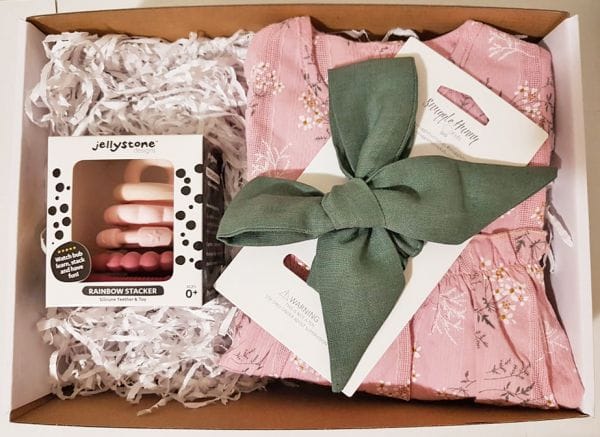 baby girl window hamper gift box with teething toy clothing and bow