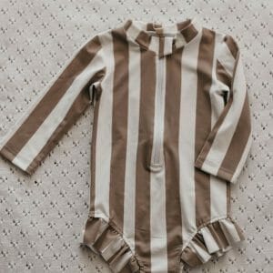 stripey baby long sleeve swimmers with frill by bencer and hazelnut