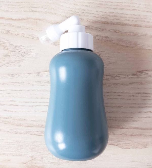 Retractable nozzle on Peri Wash Bottle for after birth Care by Mumasil